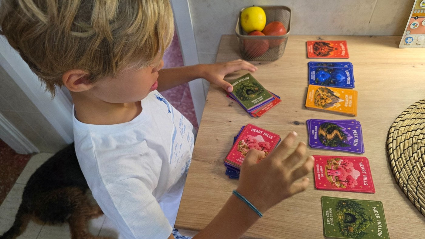 A child exploring My Inside World discovery cards at a table